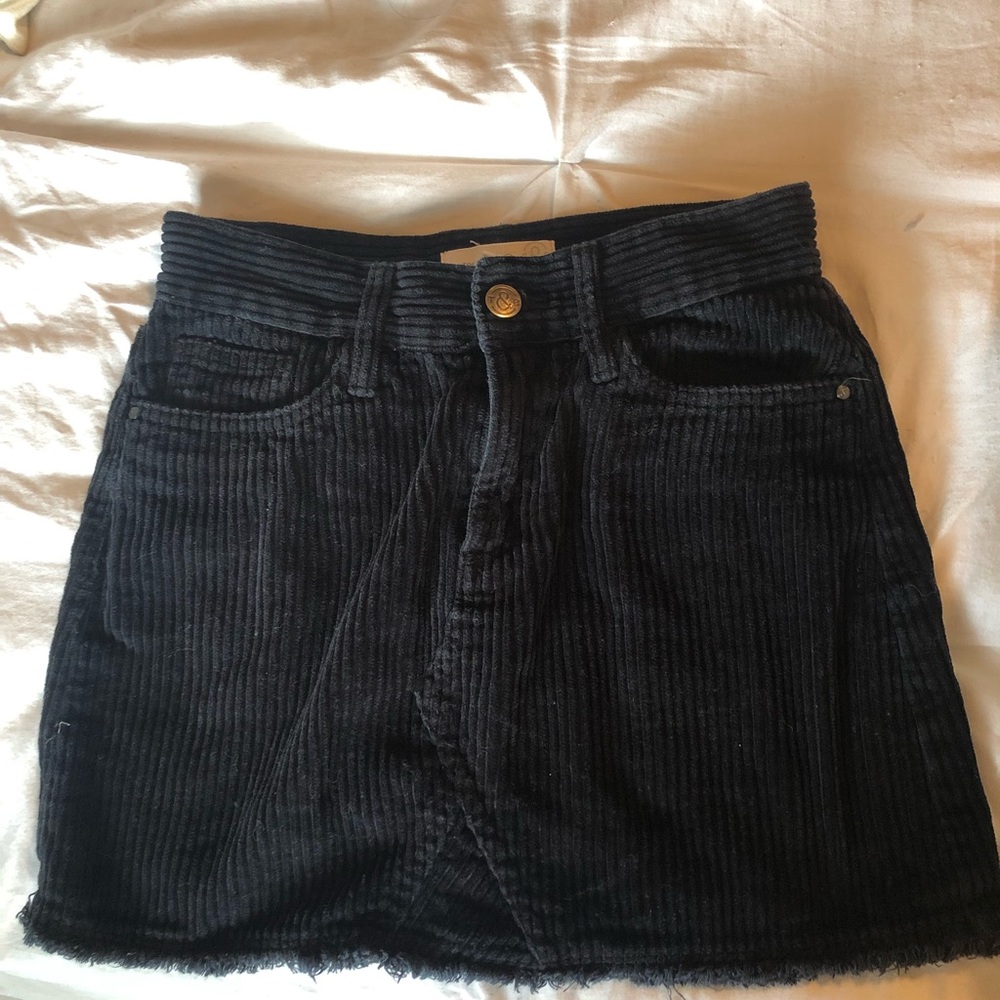 Black corduroy mini skirt